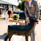 Addie Pretending to show a sheep statue in her wedding dress